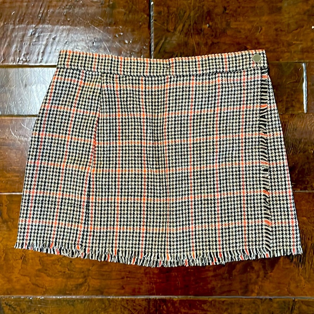 Urban Outfitters wrap mini skirt in tan/black houndstooth check.